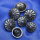Metallknopf  mit Blumen - 15 bis 18mm